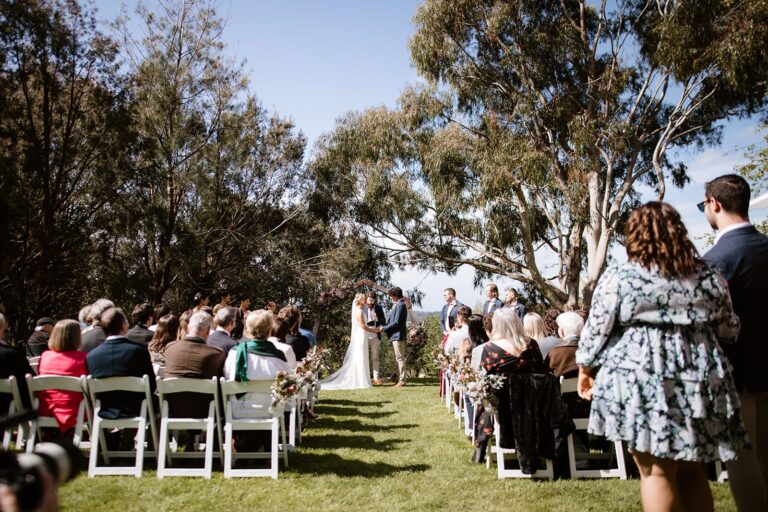 a butterfly red hill wedding day, nestled amongst trees and beautiful gardens