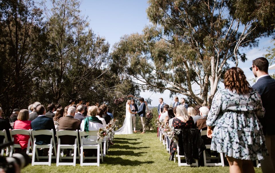 a butterfly red hill wedding day, nestled amongst trees and beautiful gardens